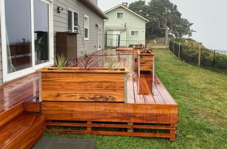 side view of a hardwood deck and hardwood planter boxes