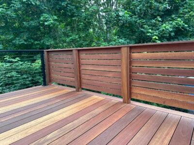 Batu deck built by AB Construction LLC with DW Construction LLC A batu tropical hardwood deck and privacy wall.