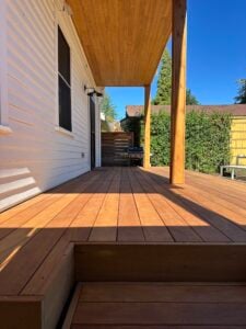 Premium Ipe decking boards with rich grain and smooth texture create a stunning outdoor space. Ideal for high-quality hardwood decks.