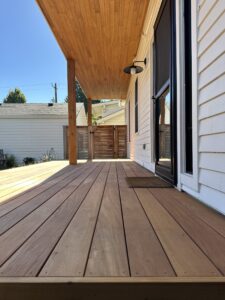 Close-up of Ipe decking boards with rich grain and smooth finish, showcasing premium tropical hardwood for durable outdoor use.