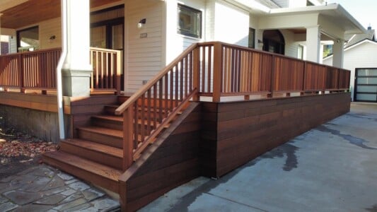 IPE deck with Fijian Mahogany rail and Japanese Cedar ceiling planks by AB Construction LLC IPE deck with Fijian Mahogany rail and Japanese Cedar ceiling planks