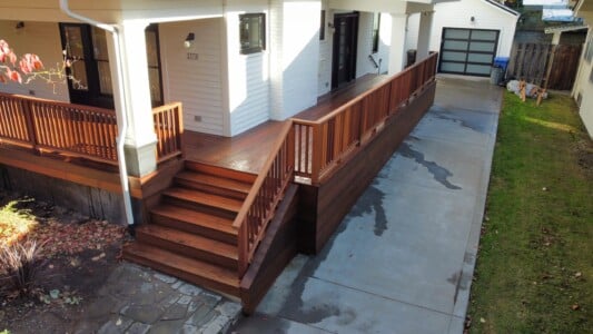 IPE deck with Fijian Mahogany rail and Japanese Cedar ceiling planks by AB Construction LLC IPE deck with Fijian Mahogany rail