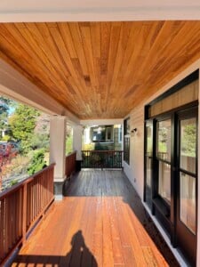 IPE deck with Fijian Mahogany rail and Japanese Cedar ceiling planks by AB Construction LLC IPE deck with Fijian Mahogany rail and Japanese Cedar ceiling planks