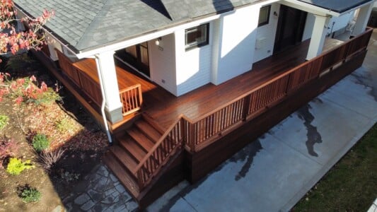 IPE deck with Fijian Mahogany rail and Japanese Cedar ceiling planks by AB Construction LLC IPE deck with Fijian Mahogany rail
