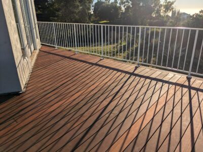 A Batu deck with a white handrail. A Batu deck with a white handrail.