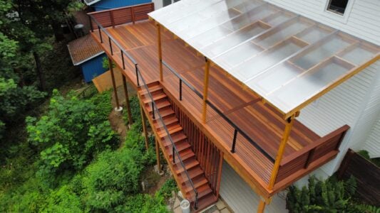 Batu deck built by AB Construction LLC with DW Construction LLC Drone view of a batu wood balcony.