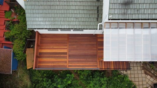 Batu deck built by AB Construction LLC with DW Construction LLC Topside image of a batu tropical hardwood balcony.