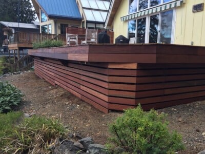 Ipe decking install on Mason Lake, Wa with batu railing and fascia boards. Ipe decking install on Mason Lake, Wa with batu railing and fascia boards.